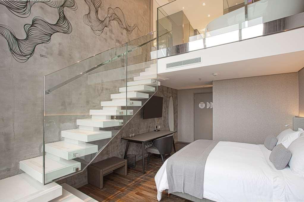 Suryaa Hotel Pinhais, Curio Collection By Hilton Zimmer foto
